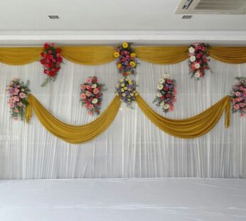 Gold And White Drapes Backdrop With Bouquets
